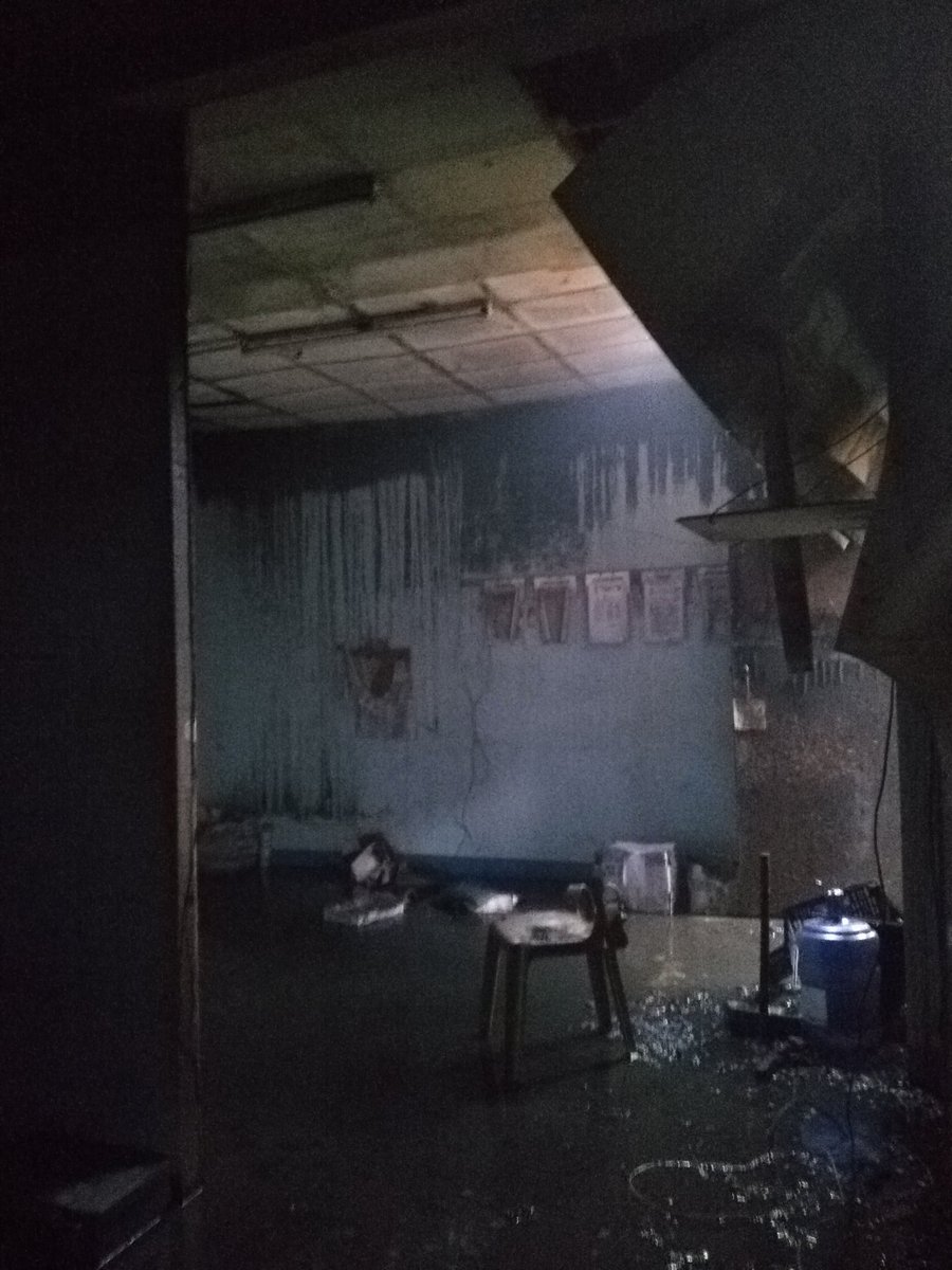 More photos from Caloocan police station fire. Roof has completely collapsed; sounds of ammunition going off still ongoing. Police still trying to salvage  equipment 
