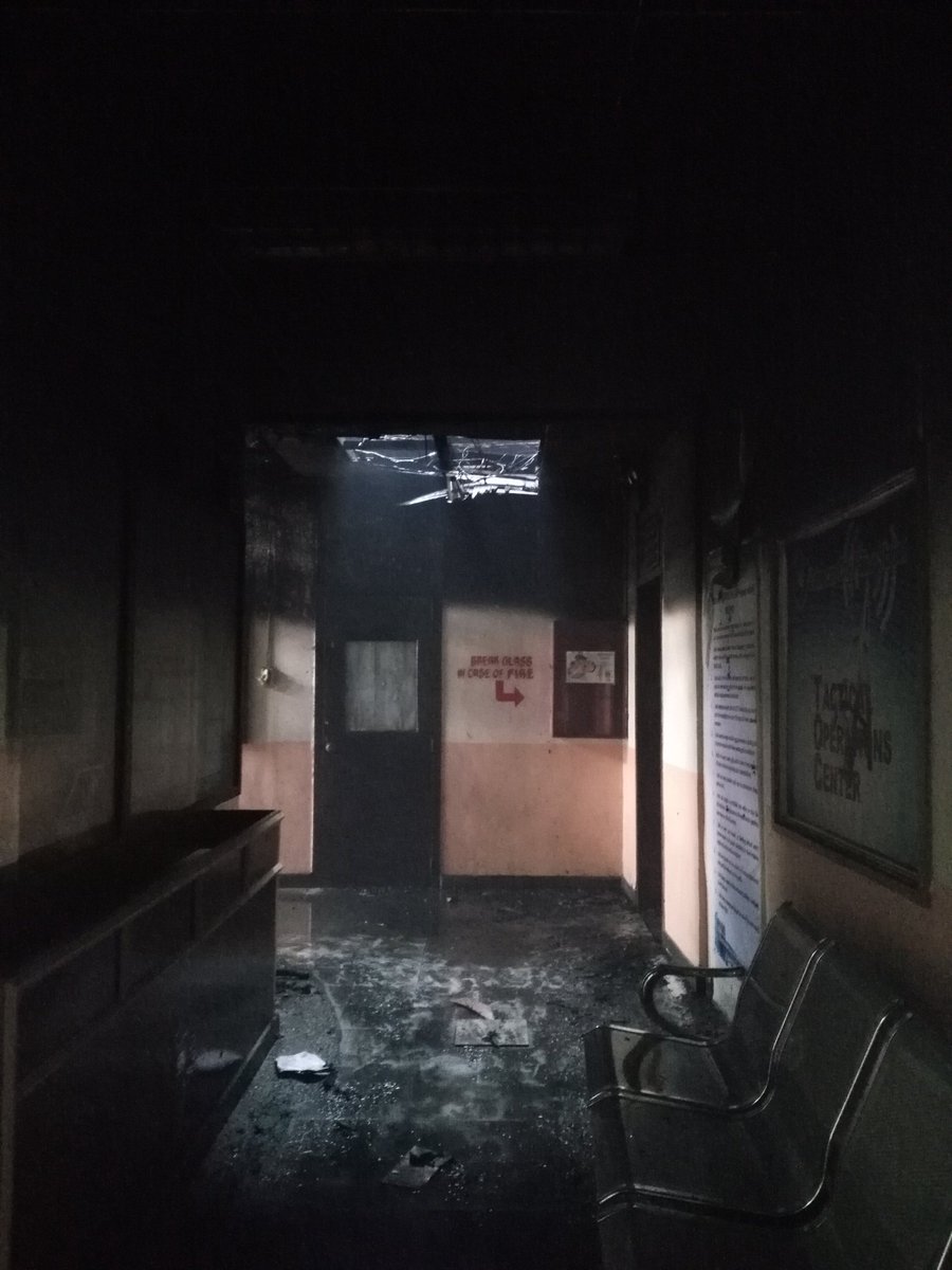 More photos from Caloocan police station fire. Roof has completely collapsed; sounds of ammunition going off still ongoing. Police still trying to salvage  equipment 