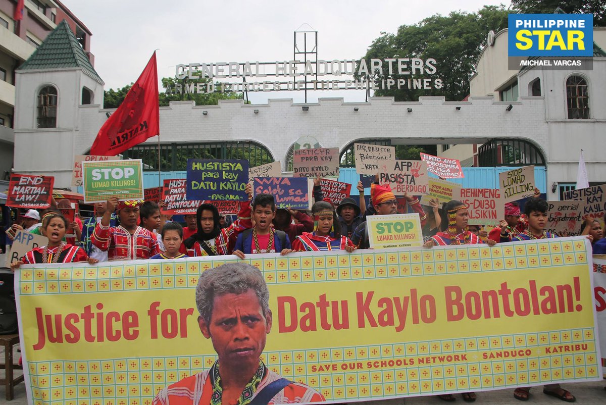 Members of the Sandugo Movement of Moro and Indigenous Peoples for Self-Determination stage a protest in front of Camp Aguinaldo as they call for justice for the death of Datu Kaylo Bontolan, who was killed during an armed encounter in Kitaotao, Bukidnon.   