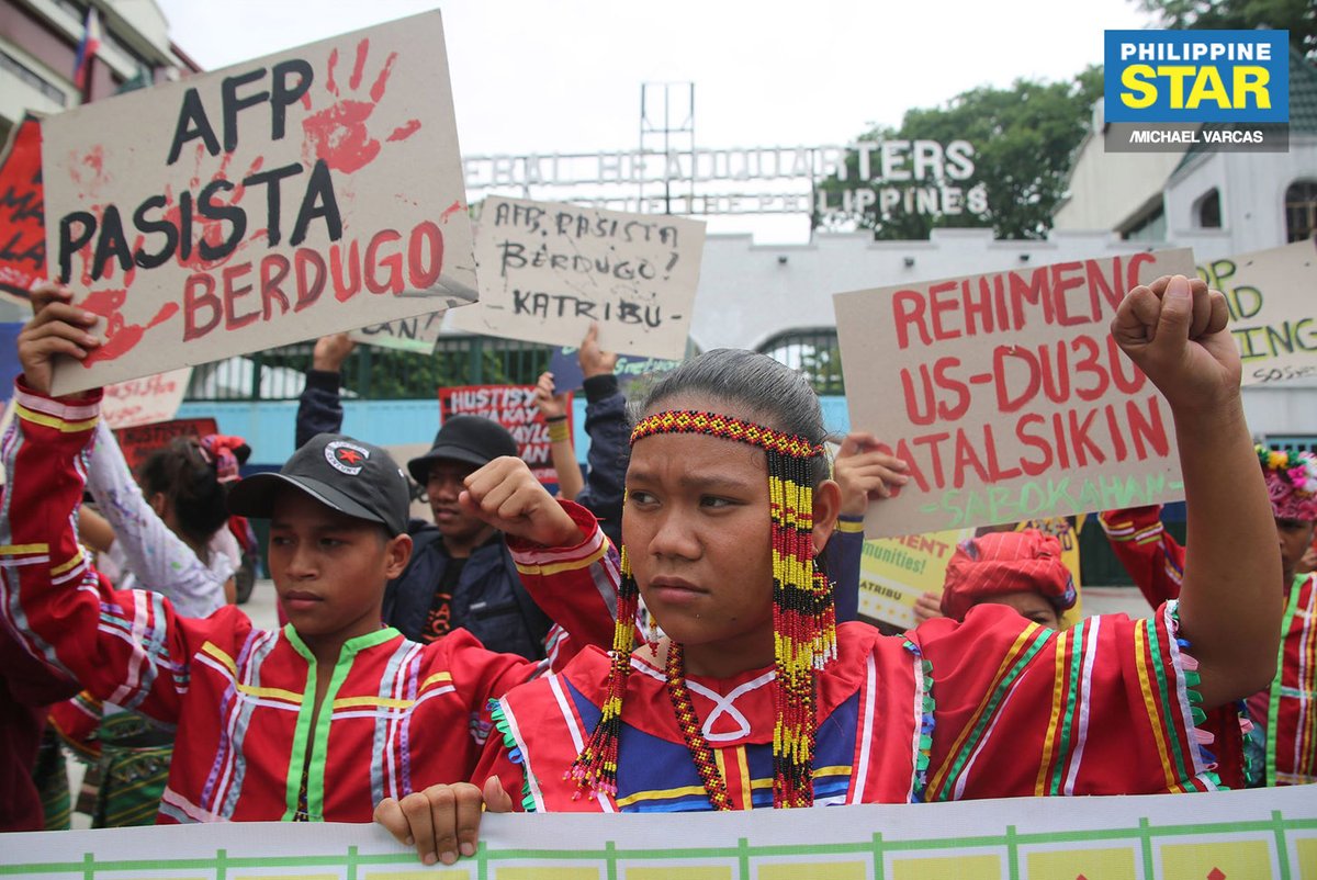 Members of the Sandugo Movement of Moro and Indigenous Peoples for Self-Determination stage a protest in front of Camp Aguinaldo as they call for justice for the death of Datu Kaylo Bontolan, who was killed during an armed encounter in Kitaotao, Bukidnon.   