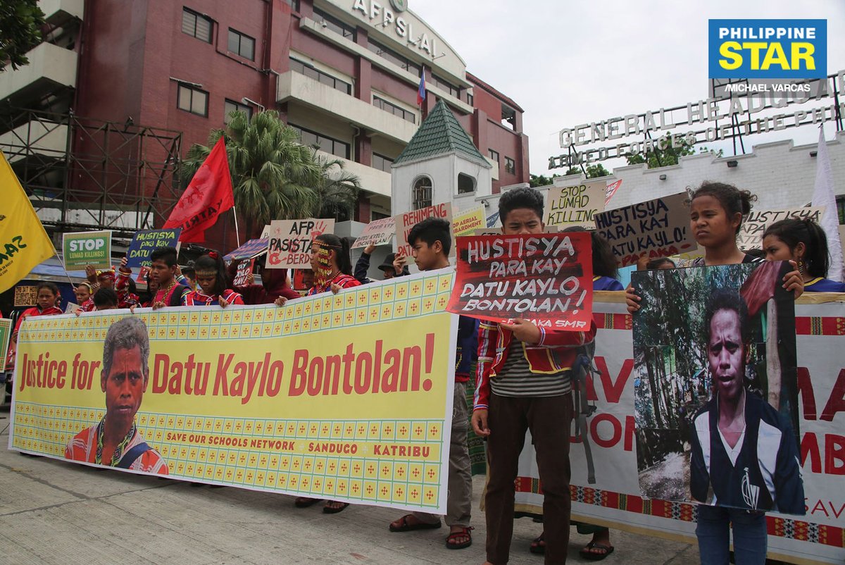 Members of the Sandugo Movement of Moro and Indigenous Peoples for Self-Determination stage a protest in front of Camp Aguinaldo as they call for justice for the death of Datu Kaylo Bontolan, who was killed during an armed encounter in Kitaotao, Bukidnon.   