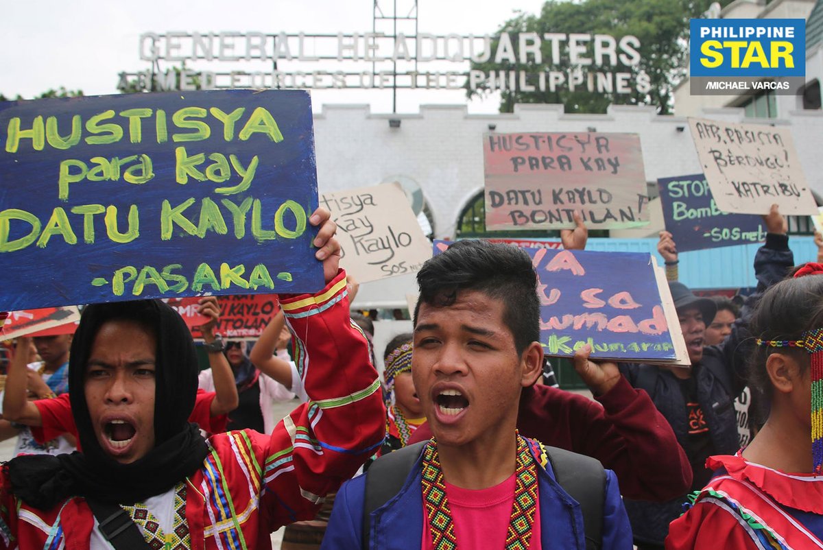 Members of the Sandugo Movement of Moro and Indigenous Peoples for Self-Determination stage a protest in front of Camp Aguinaldo as they call for justice for the death of Datu Kaylo Bontolan, who was killed during an armed encounter in Kitaotao, Bukidnon.   