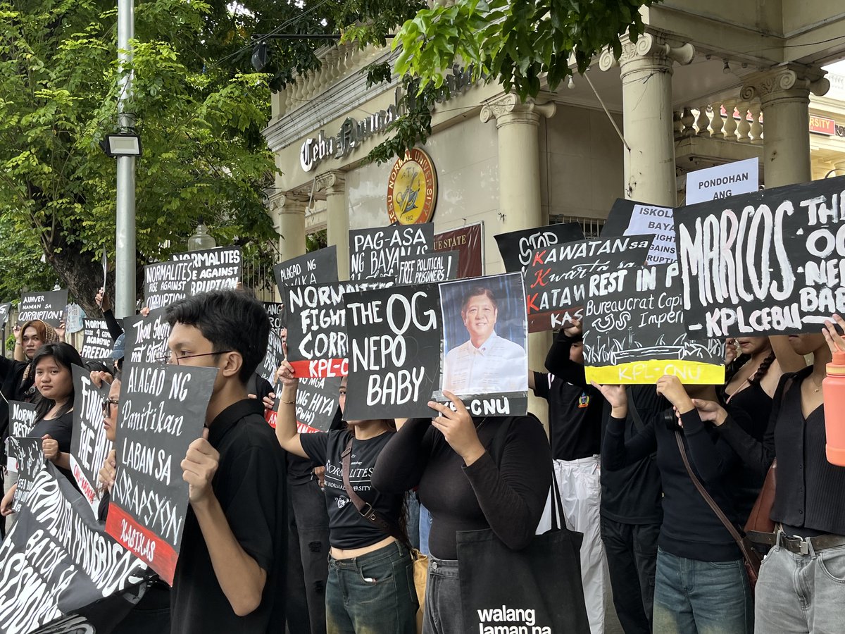 Cebu Normal University students stage a protest this morning, September 21, after the administration removed a Martial Law commemoration banner and attempted to take down a student publication post.  